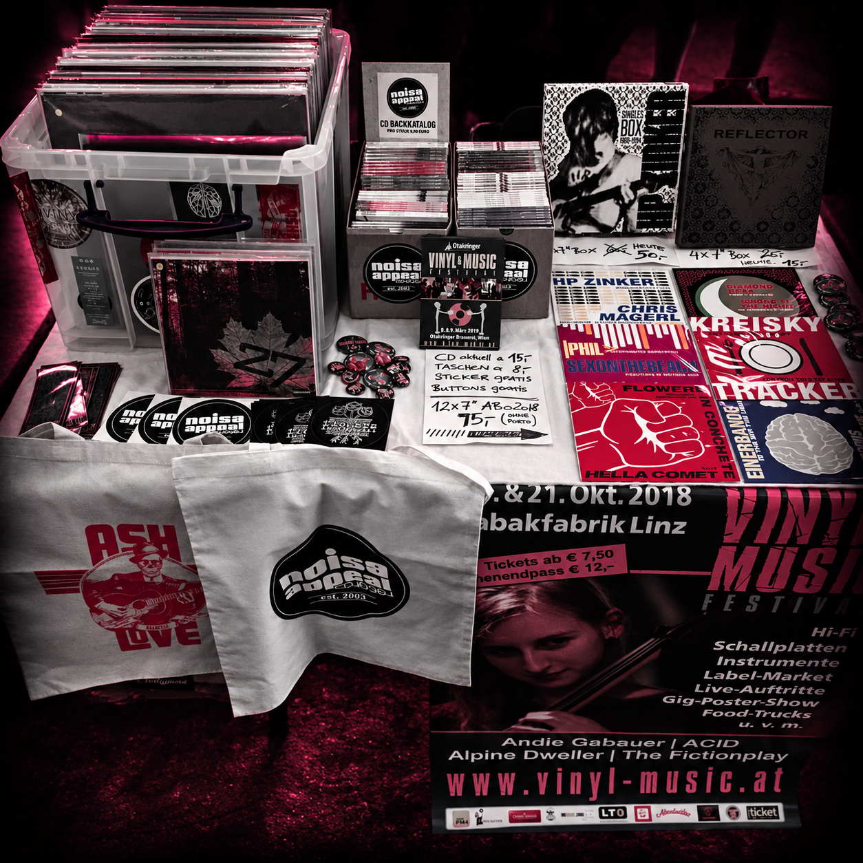 Vinyl, CDs and the HP Zinker Singles Box on a label table