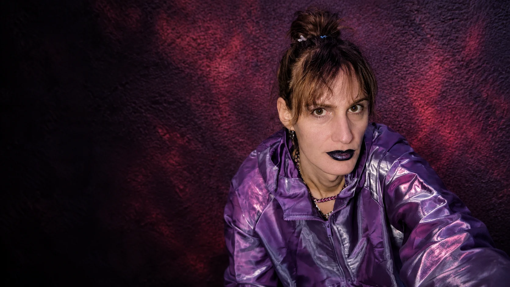 Nova Lux in a violet coat